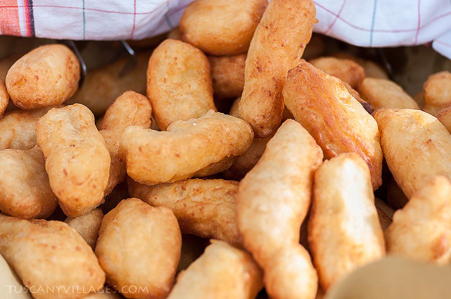 A pile of golden fried dough pieces