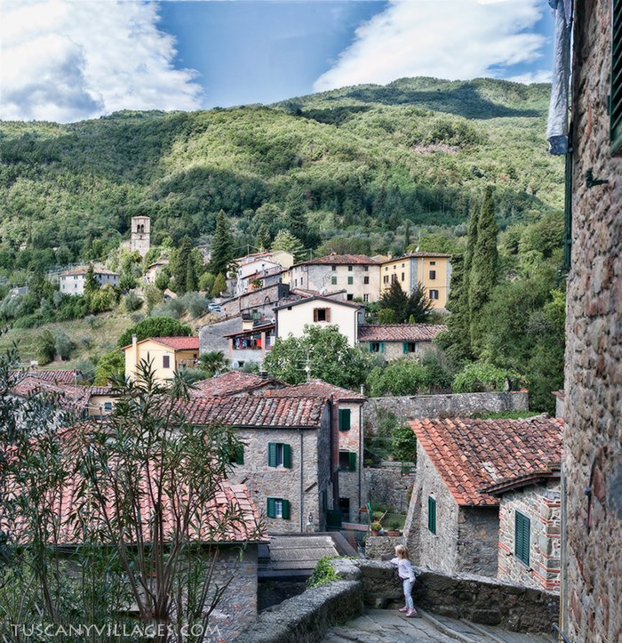 Washing on a line between old stone houses in Castelvecchio