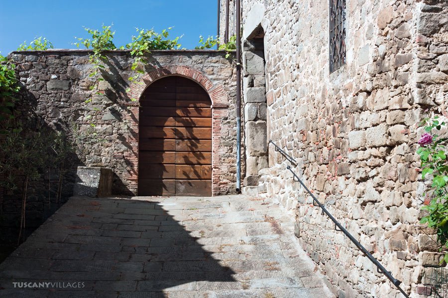 A stone arch and steps in the village of Fibbialla