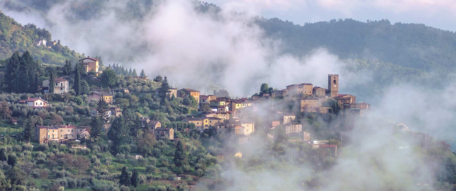Sorana rising out of the morning mist in the Pescia valley