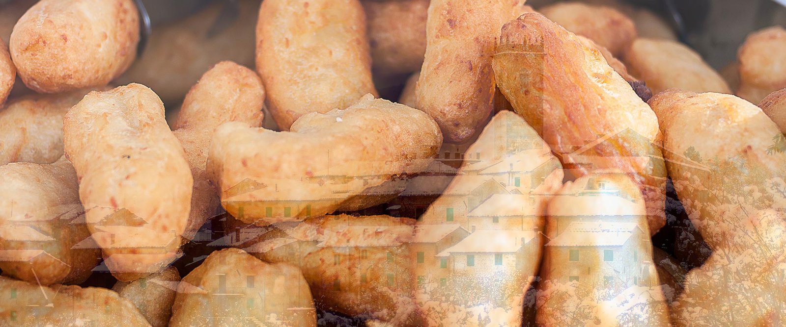 A pile of golden fried beccutini at the Stiappa festa